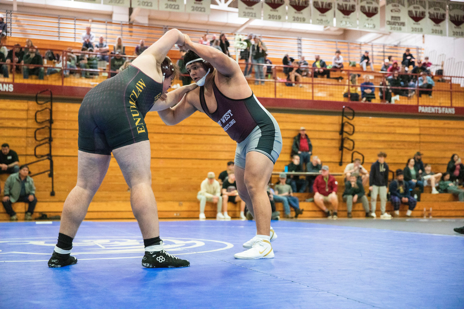 W.F. West senior Daniel Matagi wrestles Zeke Luchi of Enumclaw at 285 pounds during the Bearcat Invitational and his last home meet in Chehalis Saturday night.